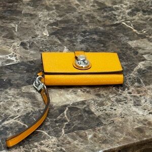 Tumi Orange Wristlet with Silver Hardware